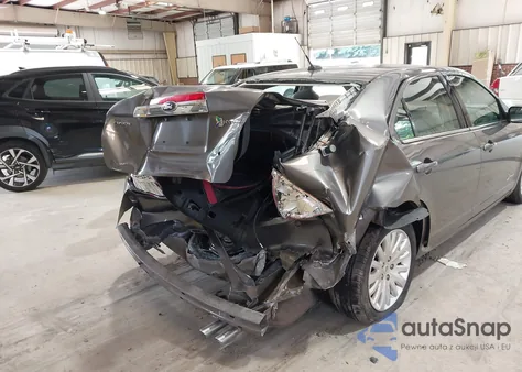 2012 Ford Fusion Hybrid из США, поврежденный, VIN 3FADP0L35CR181772